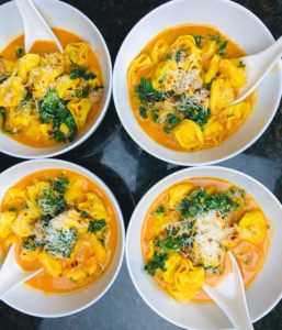 Creamy tortellini soup with Italian sausage and kale by Unstoppable Foodie. Soup recipe.
